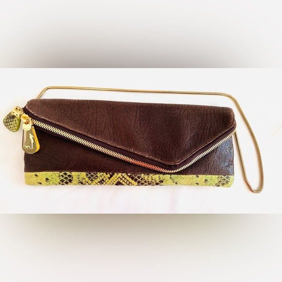 Henri Bendel leather fold over asymmetrical slim clutch